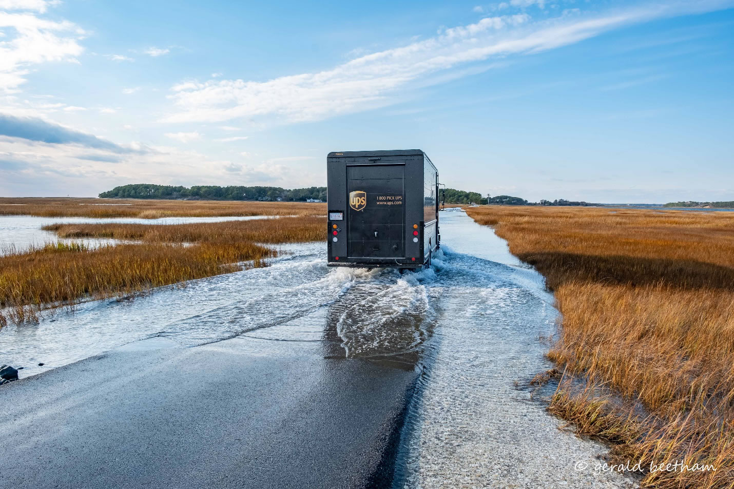 UPS Truck Driving in Water Sea Level Rise